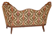 Carved_walnut_loveseat,_1930
