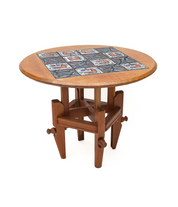 Dining table that converts into a coffee table.