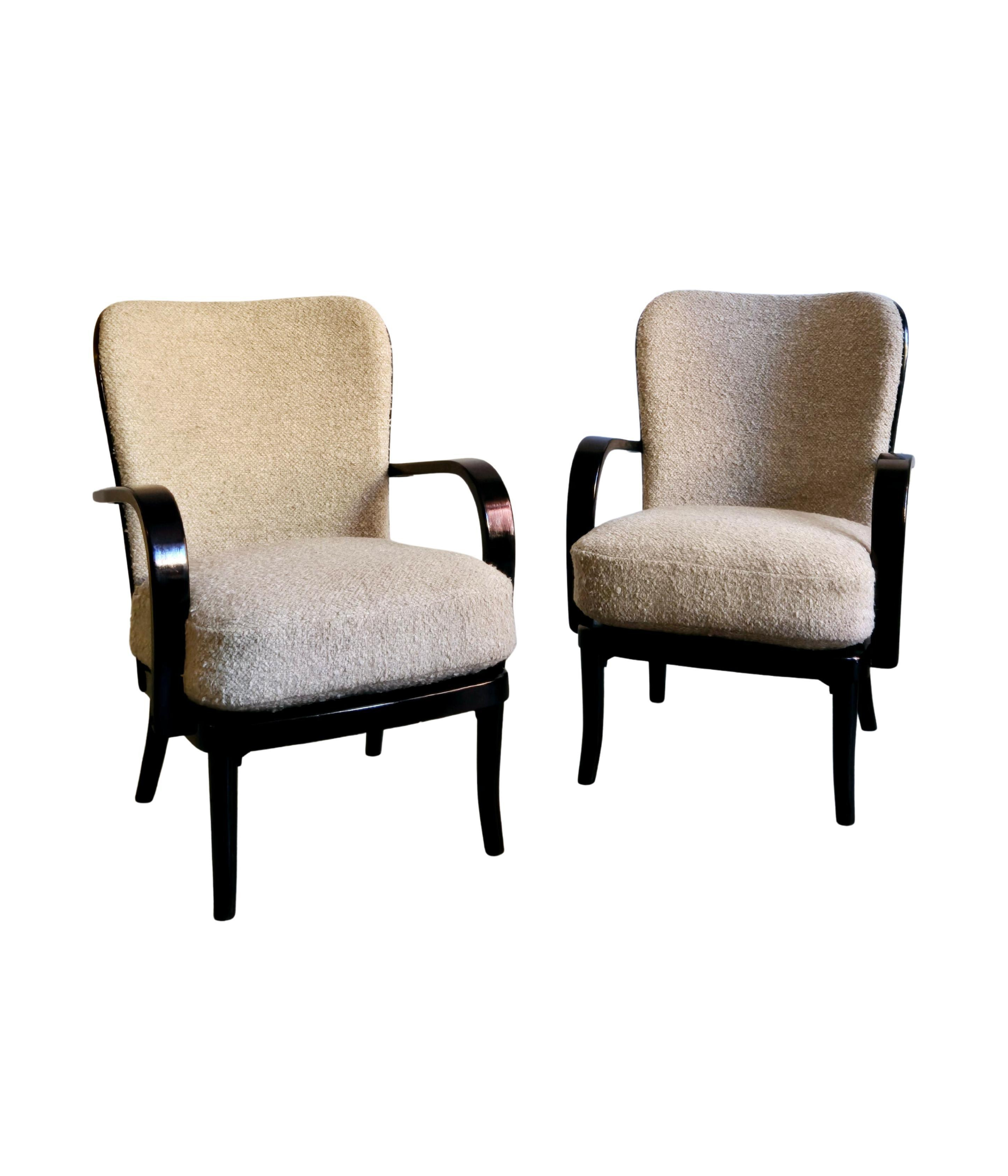 Set of 2 Werner West armchairs, Scandinavian Modern. Re-upholstered in bouclé.