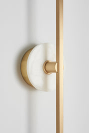 Essential_Stick_wall_sconce_in_Brass_and_Alabaster
