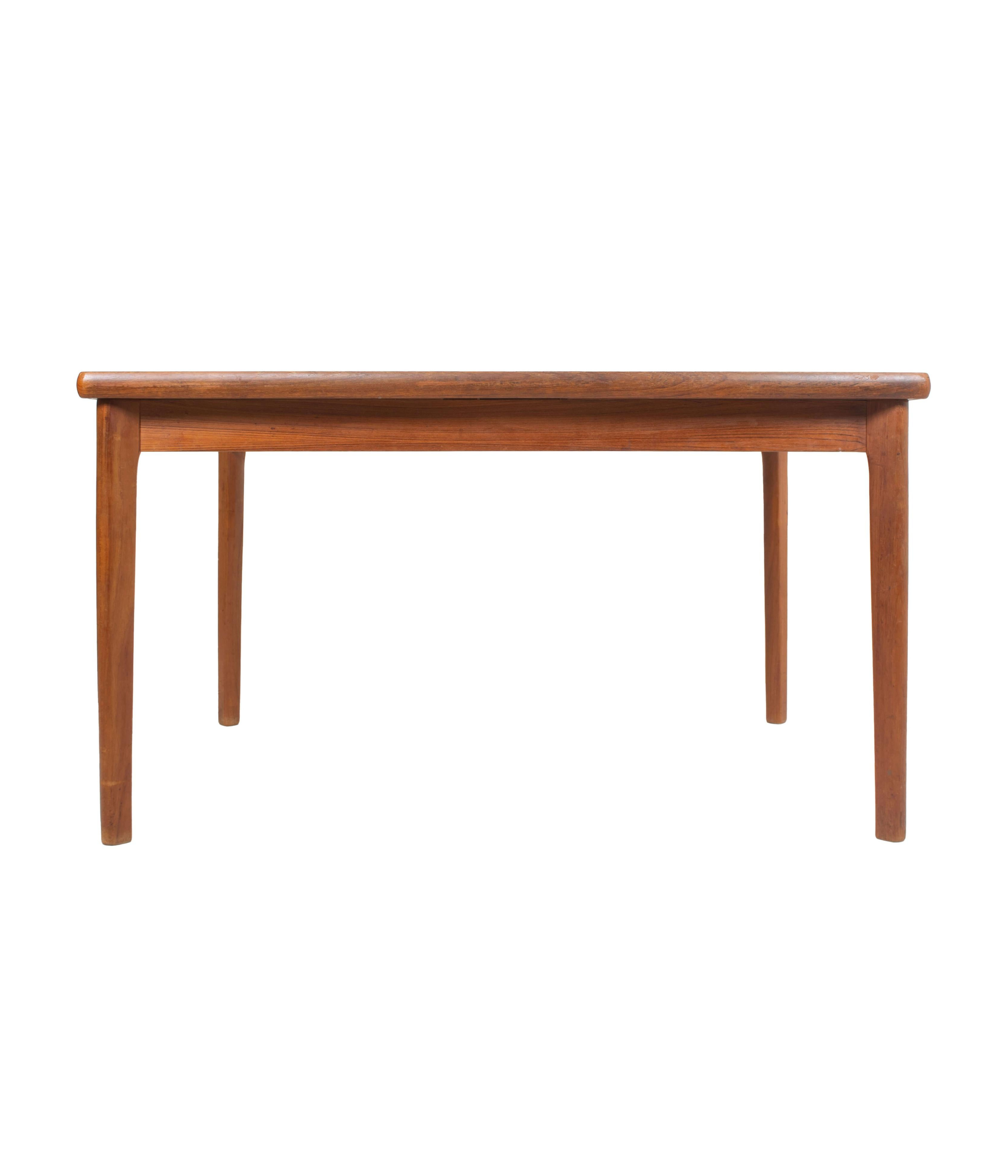 Extendable_Teak_Dining_Table_by_Henning_Kjaernulf_Denmark_1960s