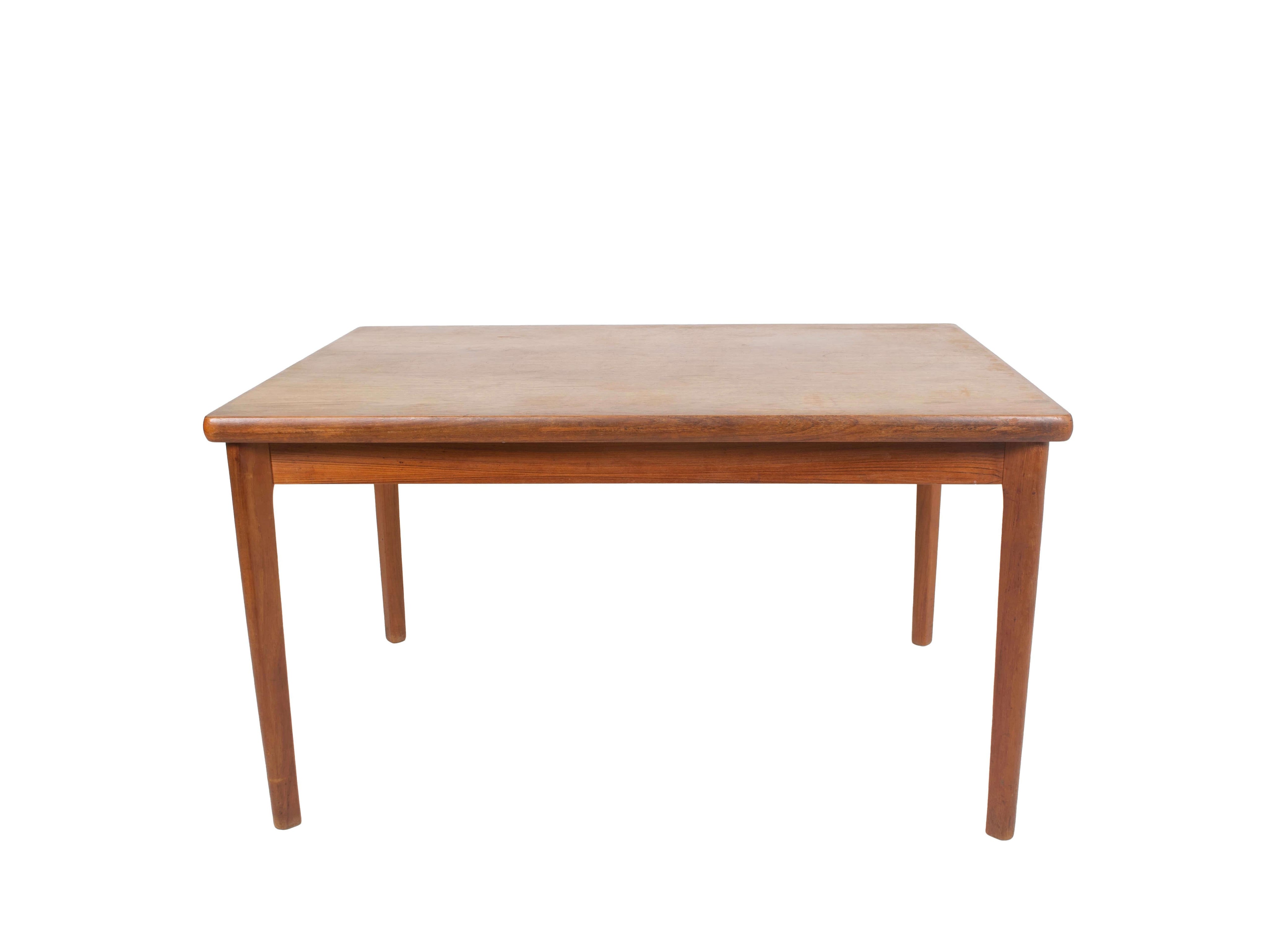 Extendable_Teak_Dining_Table_by_Henning_Kjaernulf_Denmark_1960s