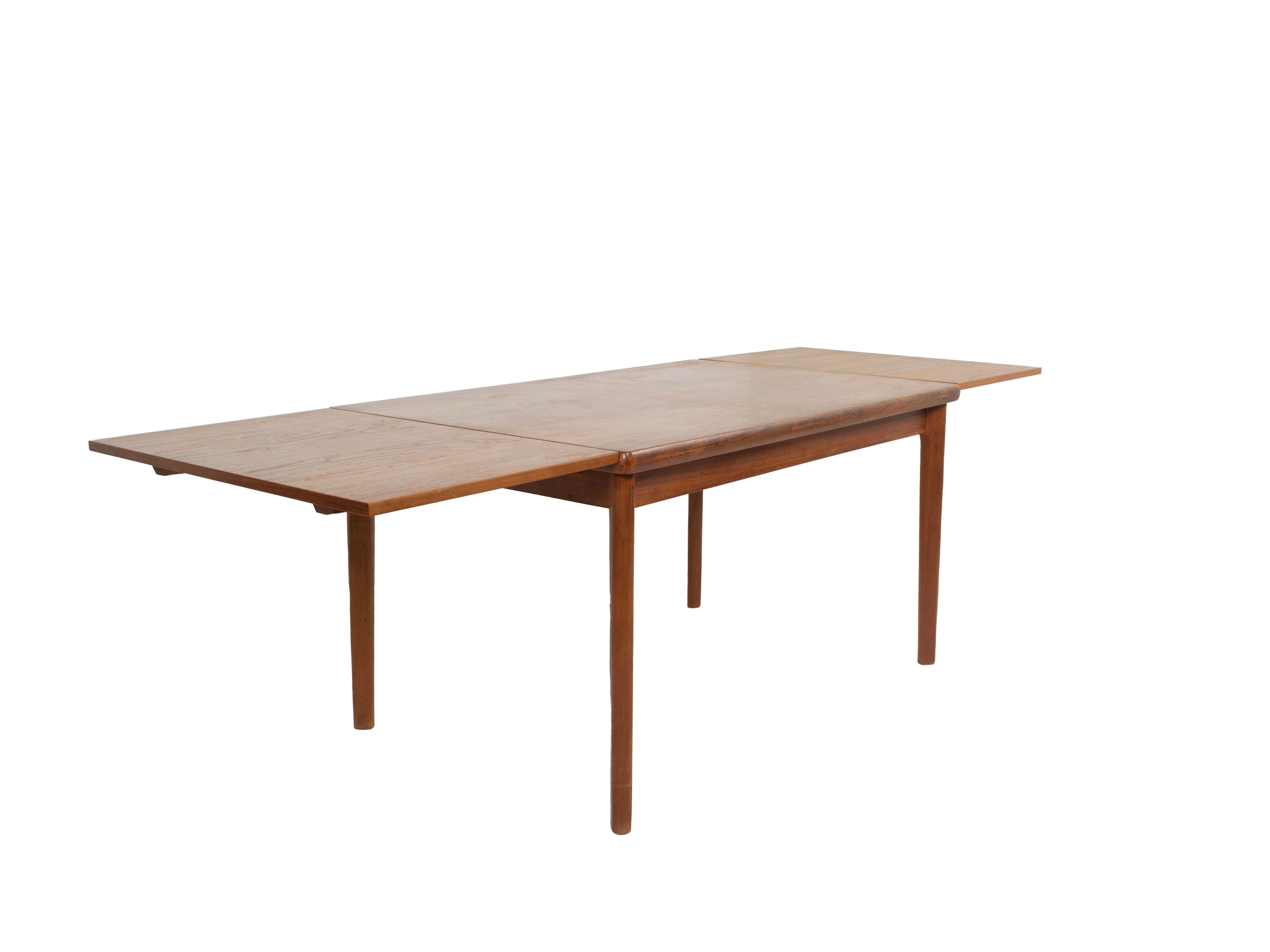 Extendable_Teak_Dining_Table_by_Henning_Kjaernulf_Denmark_1960s
