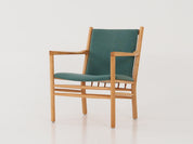 Green_Beech_armchair_in_Danish_design_1970s_designer_Erik_Ole_Jorgensen