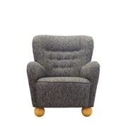 Grey_armchair_in_Scandinavian_design_production_Denmark