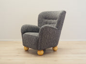 Grey_armchair_in_Scandinavian_design_production_Denmark