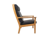 Hans_Wegner_Fauteuil_GE_265_for_GETAMA_in_Oak_and_Black_Leather_1980