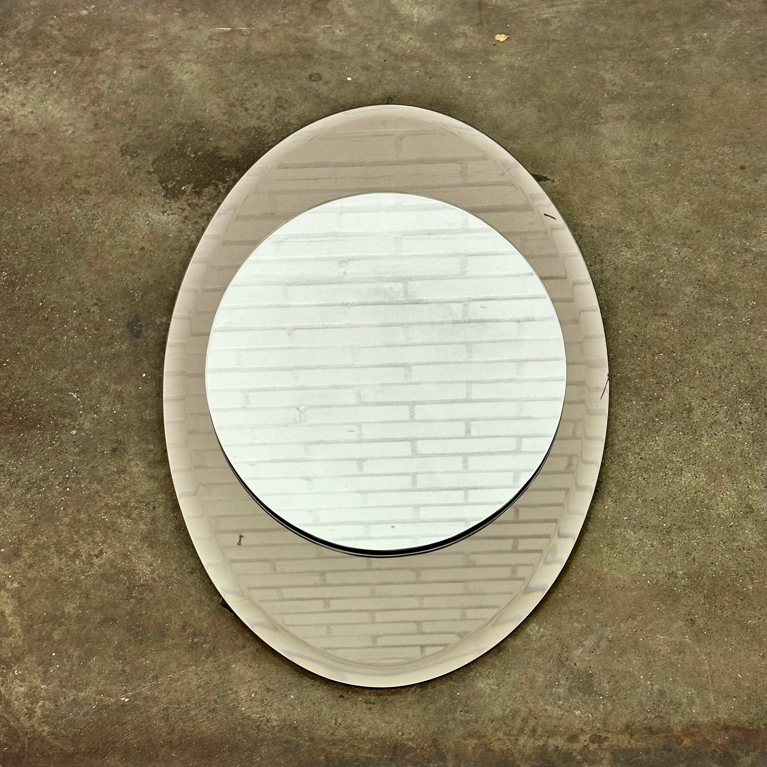 Italian_vintage_oval_mirror_with_taupe_tinted_glass
