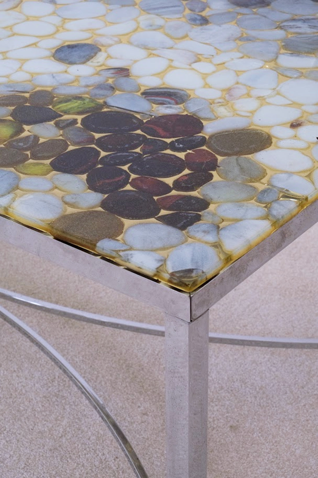 Metallic_Resin_Table_with_Embedded_Stones_from_Sweden