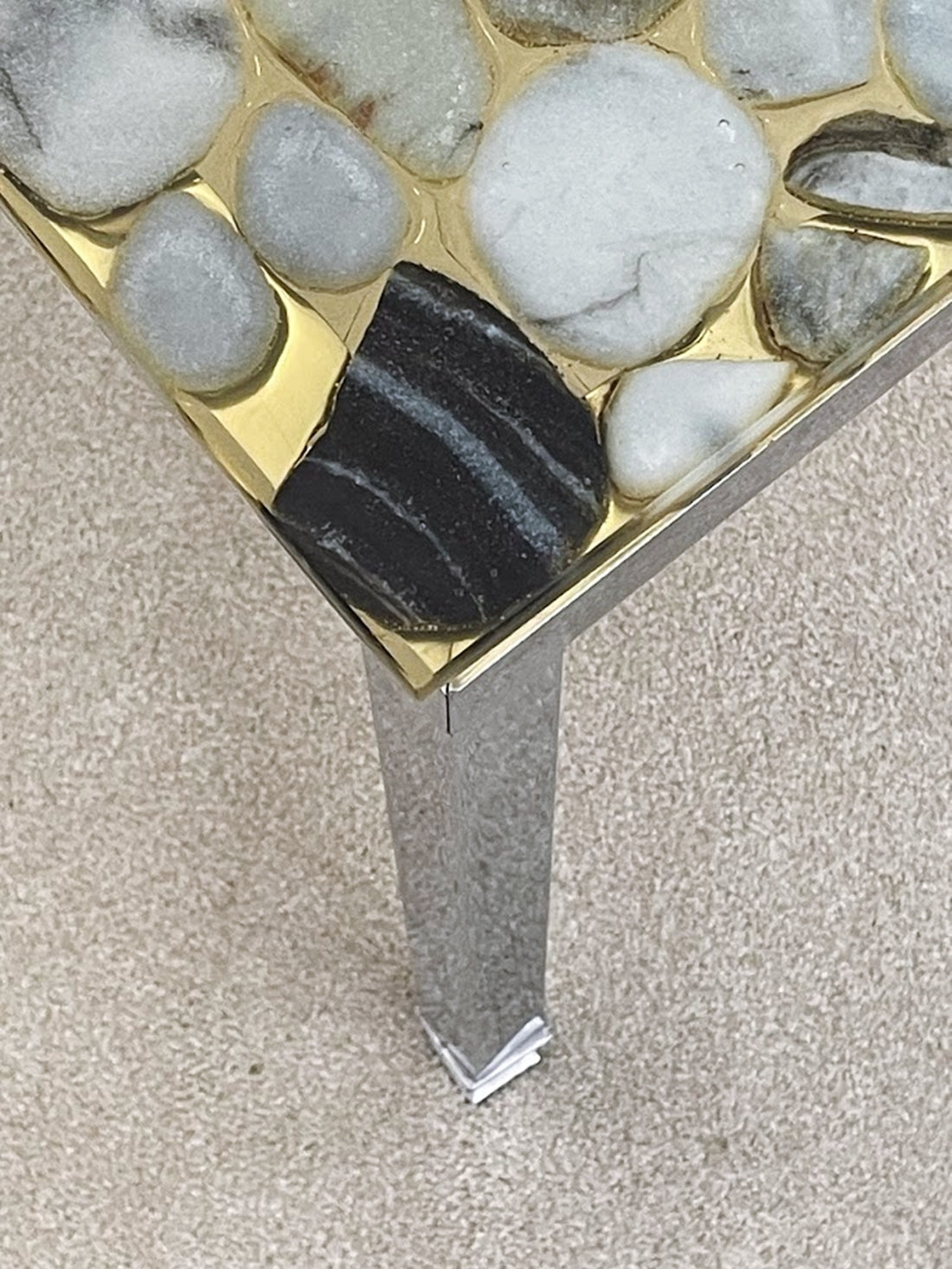 Metallic_Resin_Table_with_Embedded_Stones_from_Sweden