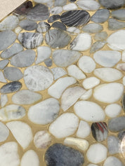Metallic_Resin_Table_with_Embedded_Stones_from_Sweden