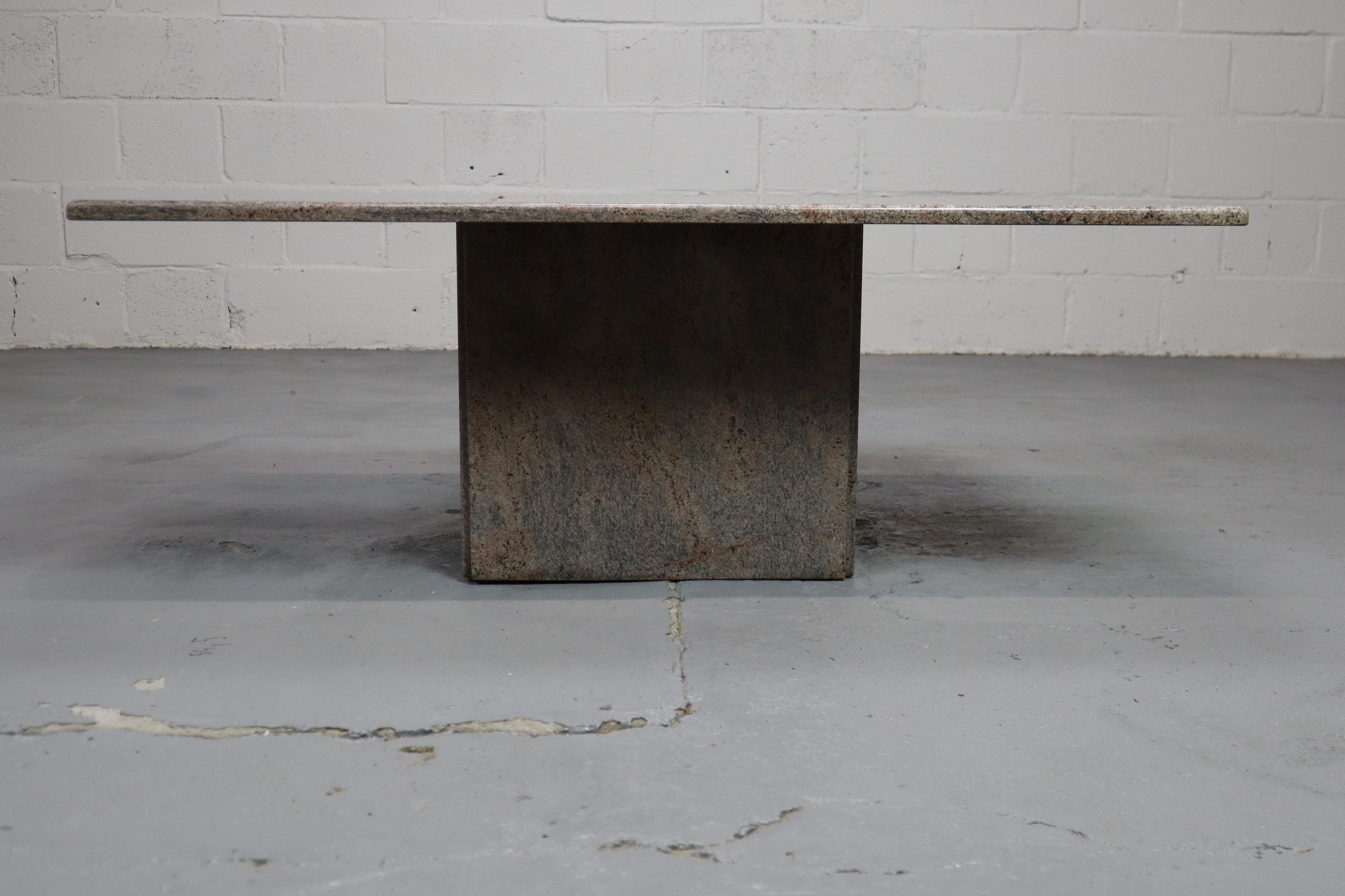 Minimalist_pink_granite_coffee_table_1980_s_Belgium