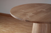 Pedestal_Table_in_Wild_Oak_with_Patchwork_Inlays