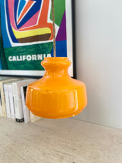 Pop_hanging_lamp_in_bright_orange_glass_from_1960