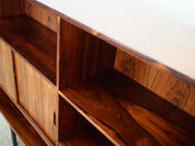 Rosewood_bookcase_in_Danish_design_1970s_designer_Erik_Jensen_production_Westergaards_M_belfabrik