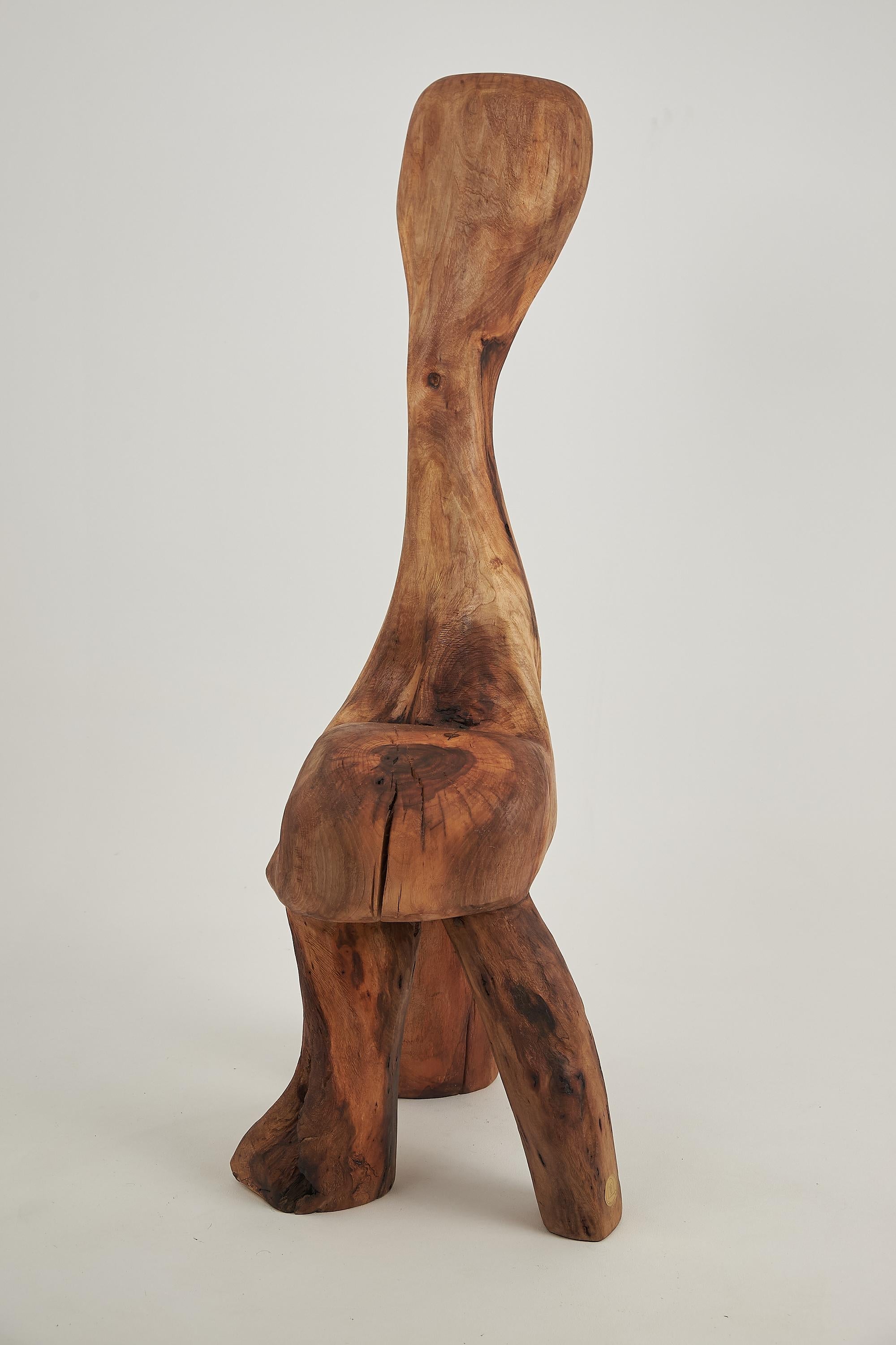 Sculptural_Carved_Chair_From_Walnut_Wood.