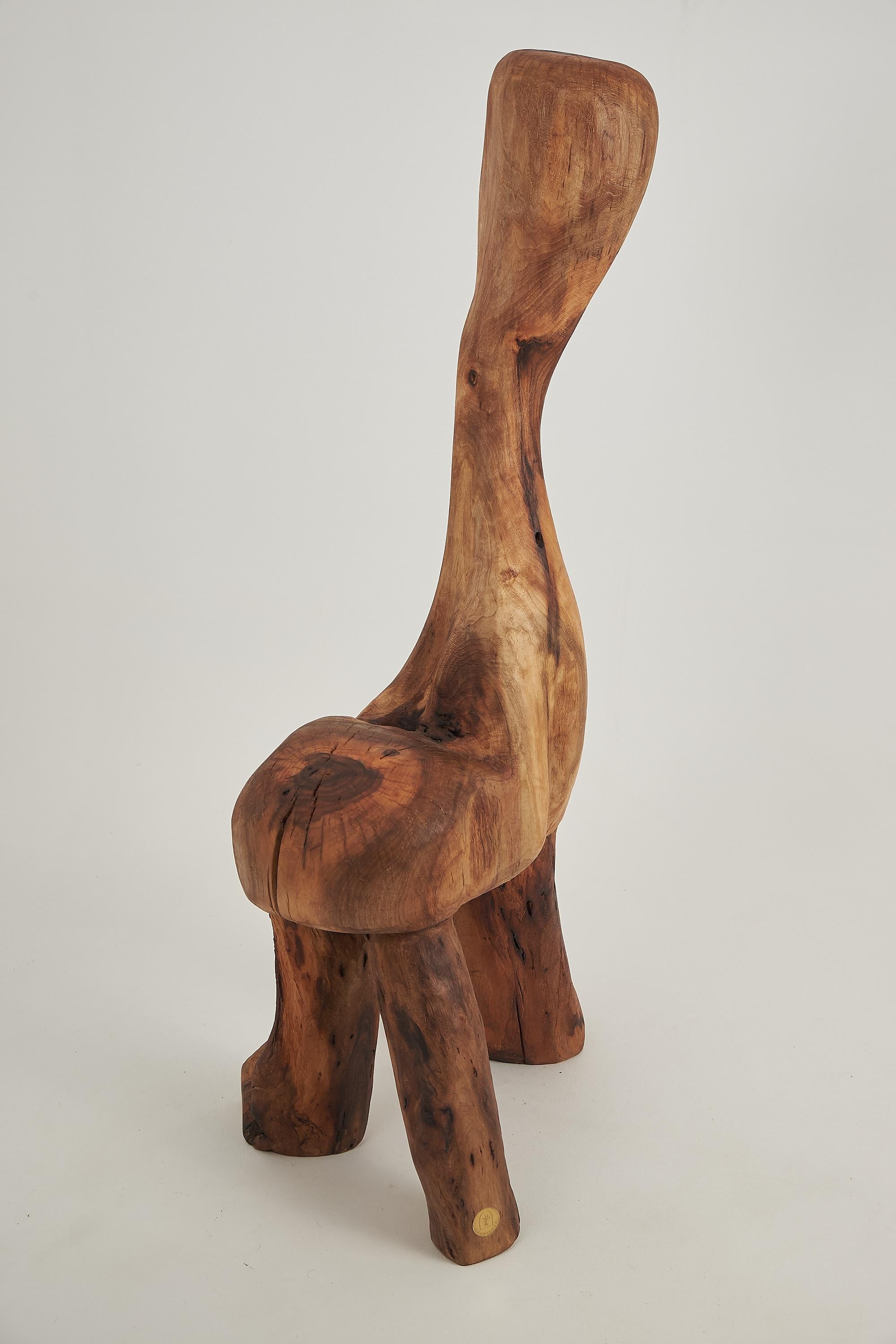 Sculptural_Carved_Chair_From_Walnut_Wood.