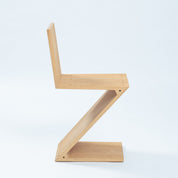 Set_of_2_Zigzag_Chairs_in_Elmwood_attributed_to_Gerrit_Thomas_Rietveld_for_Rietveld,_1990s