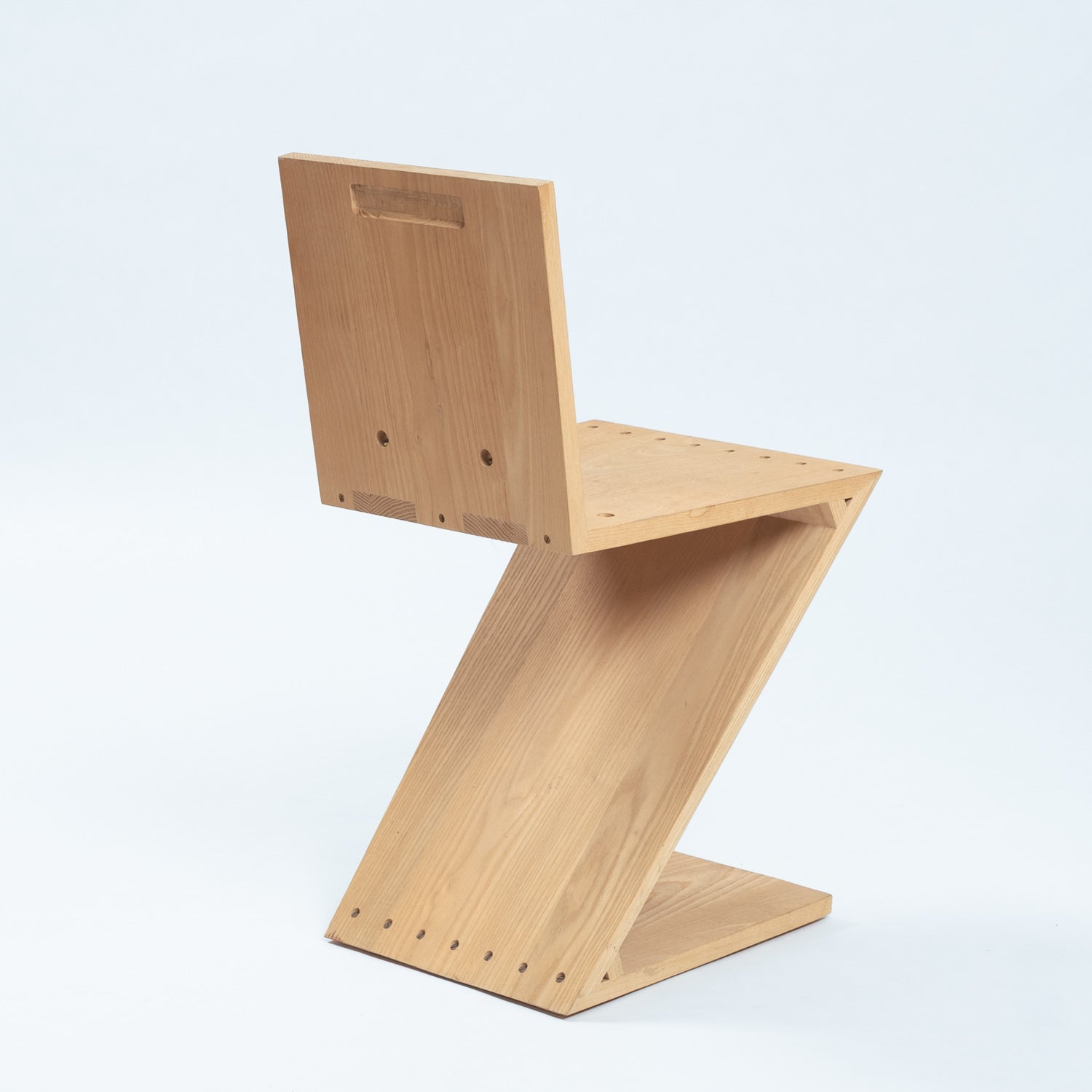 Set_of_2_Zigzag_Chairs_in_Elmwood_attributed_to_Gerrit_Thomas_Rietveld_for_Rietveld,_1990s
