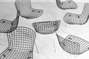 Set_of_7_Black_and_White_wire_chairs_by_Harry_Bertoia_for_Knoll_International_1970