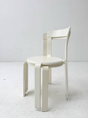 Set_of_two_white_Poli_model_3700_stacking_chairs_from_Dietiker_1993s
