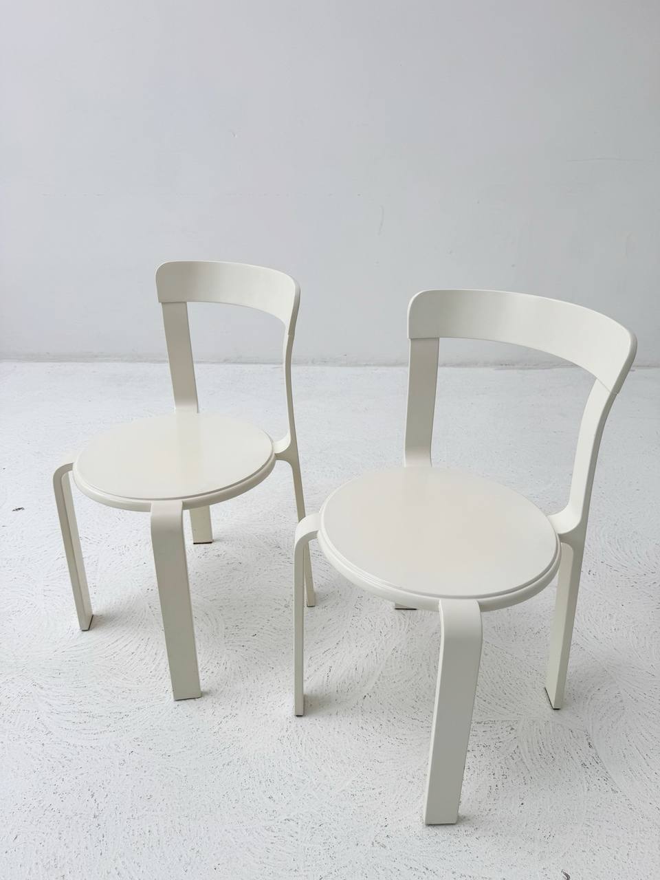 Set_of_two_white_Poli_model_3700_stacking_chairs_from_Dietiker_1993s