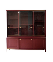 Sideboard_or_double-body_bookcase_covered_in_burgundy_imitation_leather_by_Umberto_Mascagni_1950s