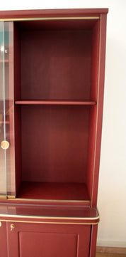 Sideboard_or_double-body_bookcase_covered_in_burgundy_imitation_leather_by_Umberto_Mascagni,_1950s