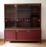 Sideboard_or_double-body_bookcase_covered_in_burgundy_imitation_leather_by_Umberto_Mascagni,_1950s