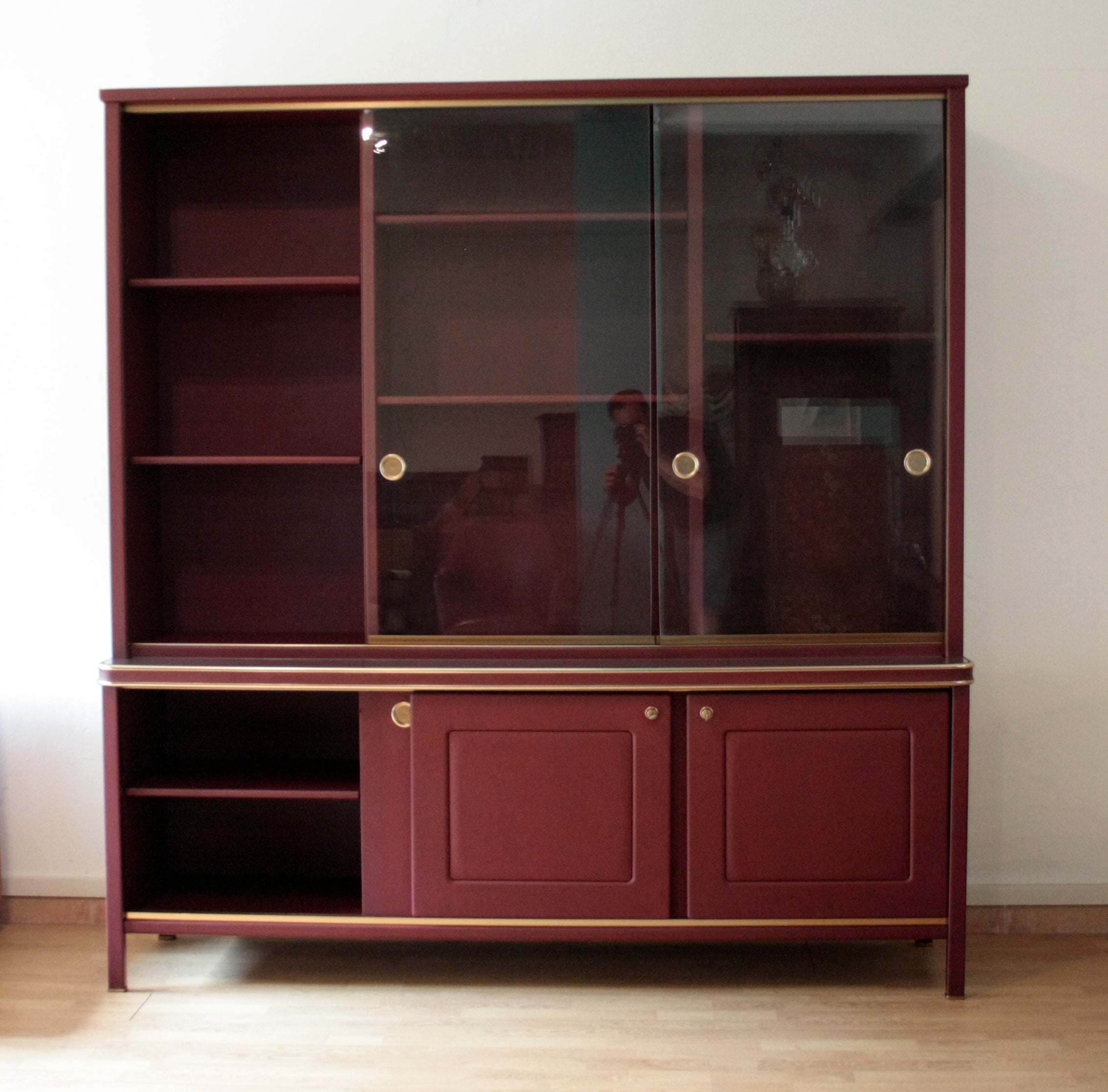 Sideboard_or_double-body_bookcase_covered_in_burgundy_imitation_leather_by_Umberto_Mascagni,_1950s