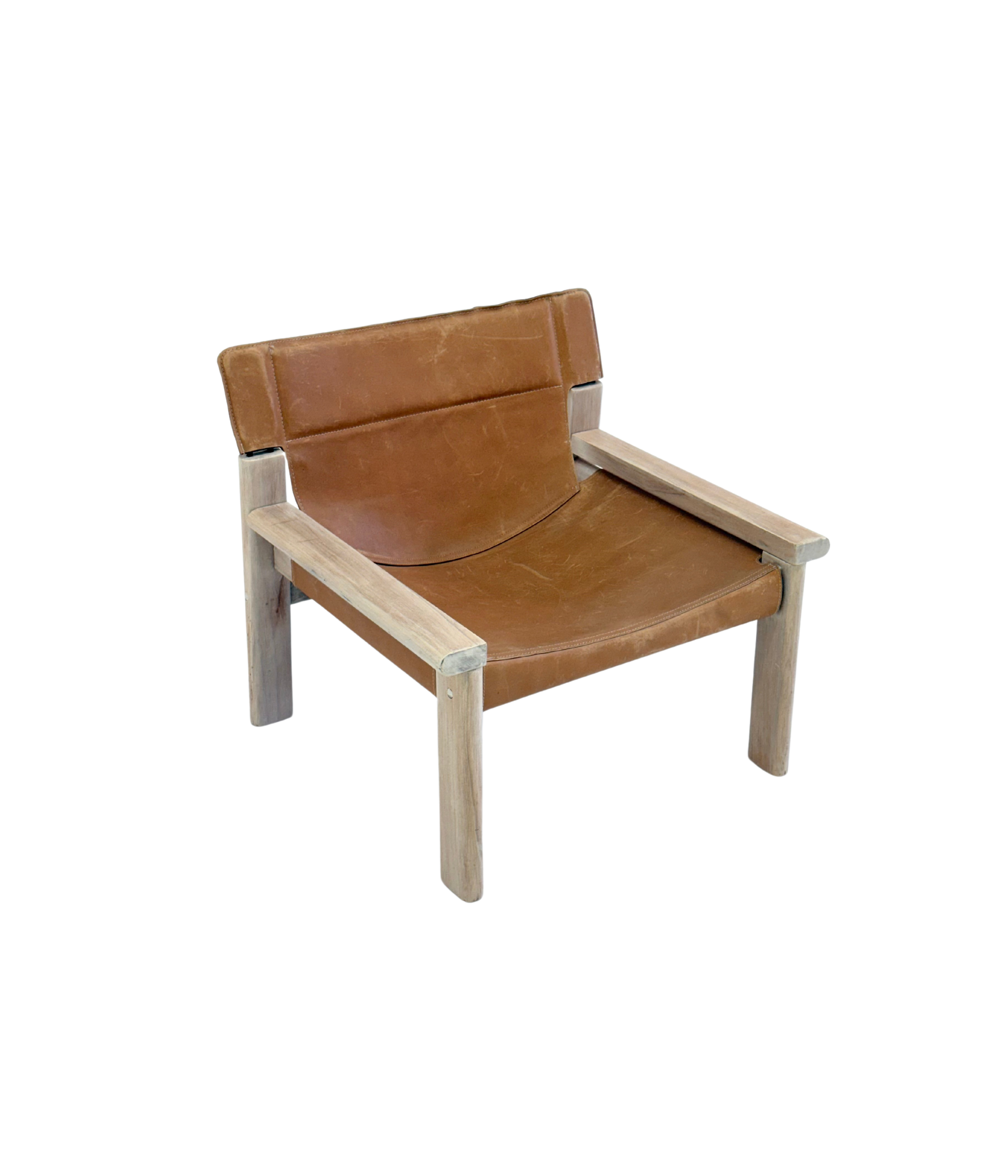 Stylish_vintage_armchair_with_saddle_leather_seat