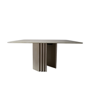 Travertine_dining_table_with_sculptural_base,_Italy_1960s