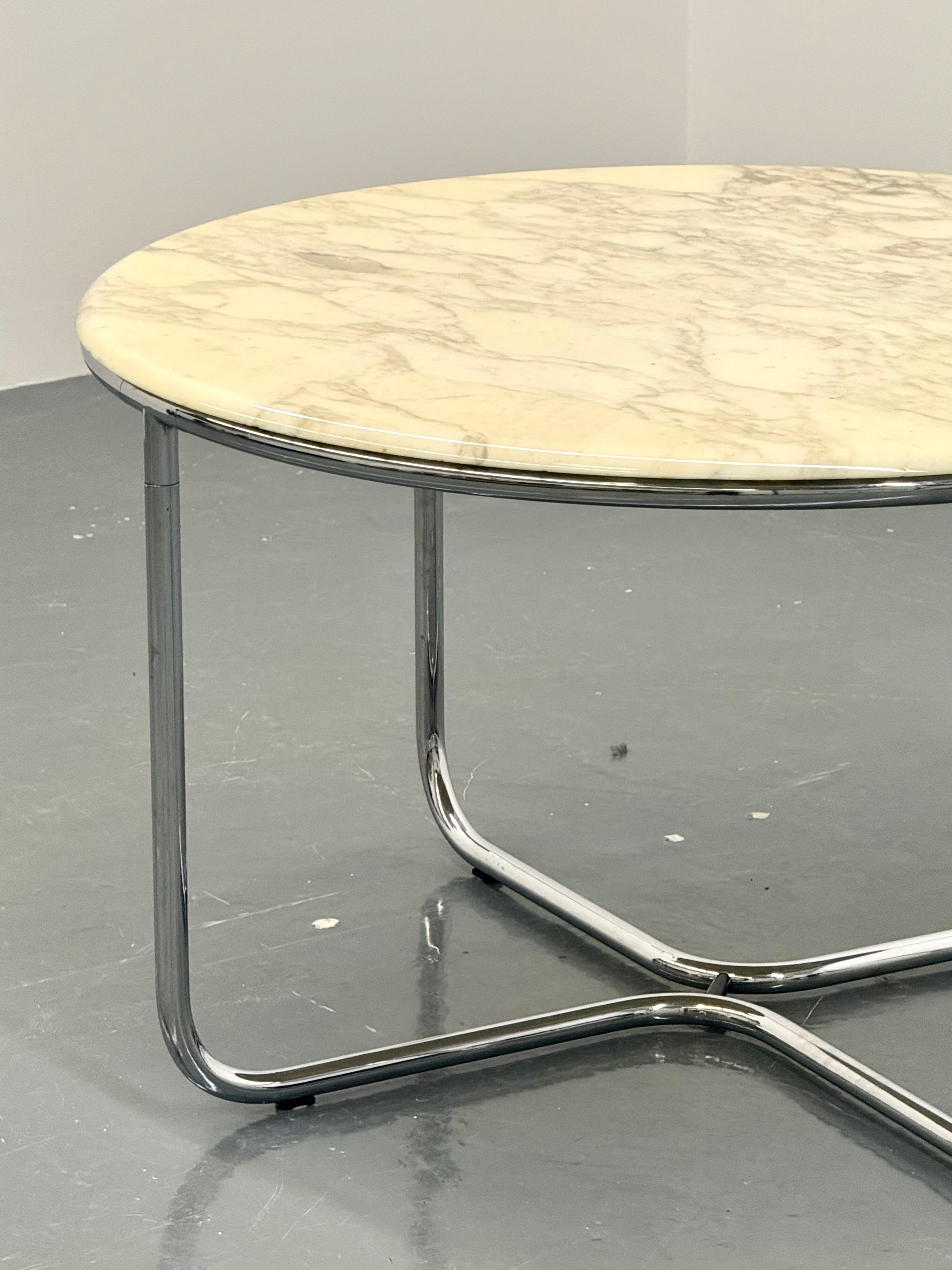 Vintage_round_marble_dining_table_with_tubular_frame_base