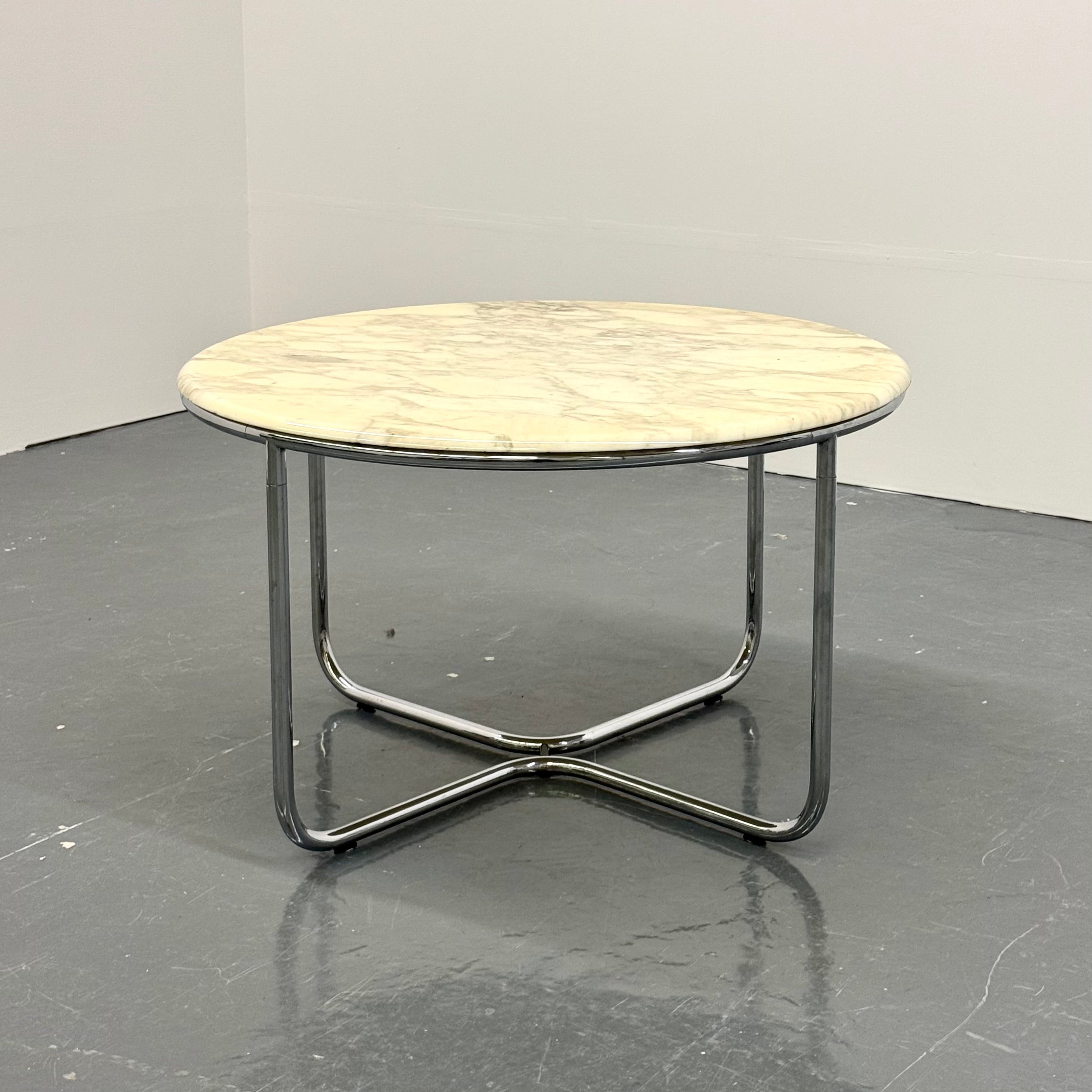 Vintage_round_marble_dining_table_with_tubular_frame_base