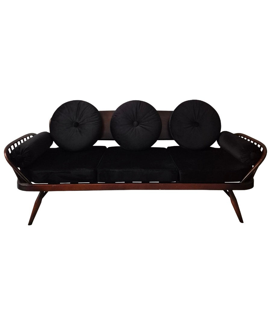 A_rare_stylish_sofa_by,_Midcentury_Modern._Re-upholstered_in_black_velvet