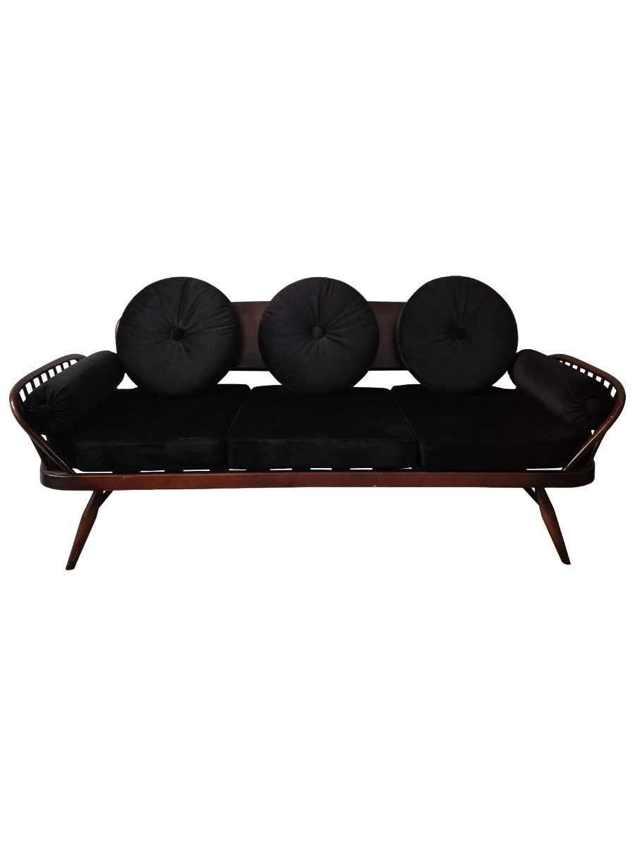 A_rare_stylish_sofa_by,_Midcentury_Modern._Re-upholstered_in_black_velvet