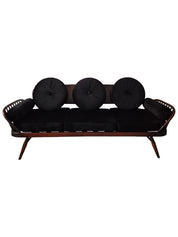 A_rare_stylish_sofa_by,_Midcentury_Modern._Re-upholstered_in_black_velvet