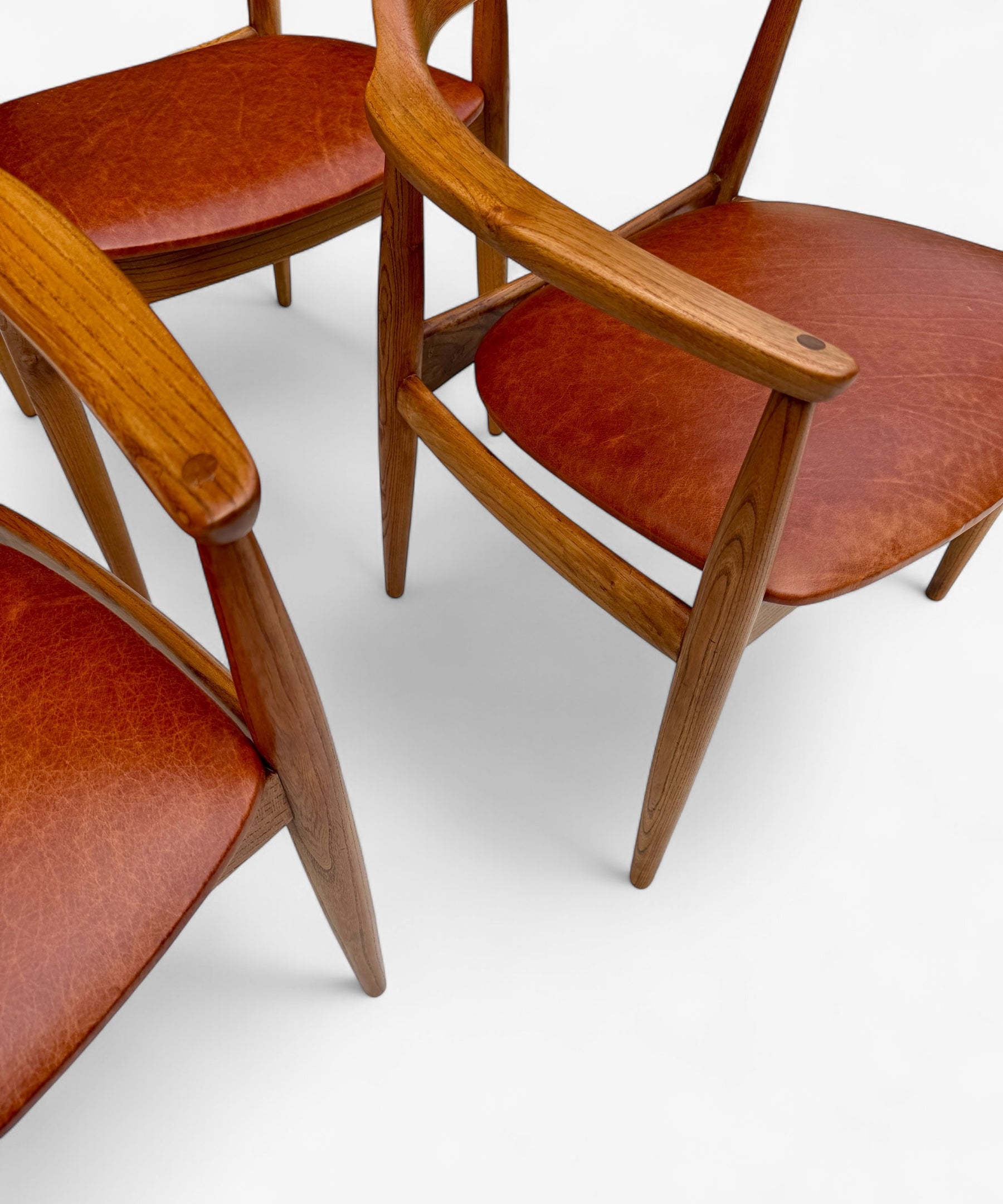 A_Set_of_4_Round_Back_Elm_Wood_Armchairs_by_Illum_Wikkelso_1960's_Denmark