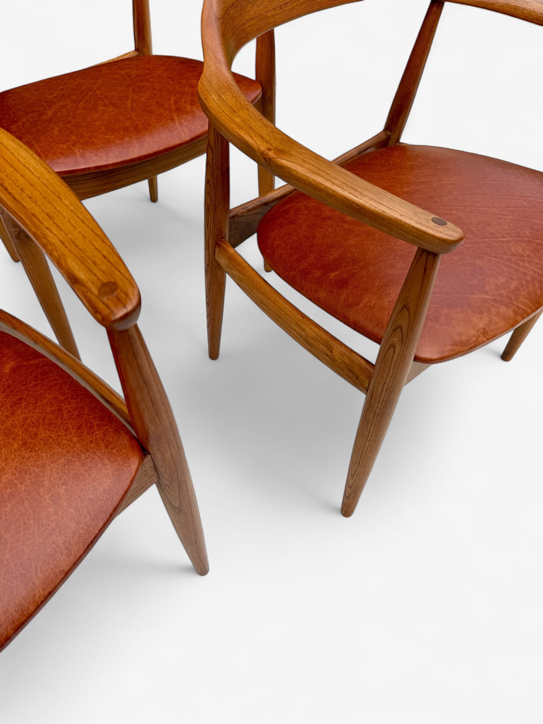 A_Set_of_4_Round_Back_Elm_Wood_Armchairs_by_Illum_Wikkelso_1960's_Denmark