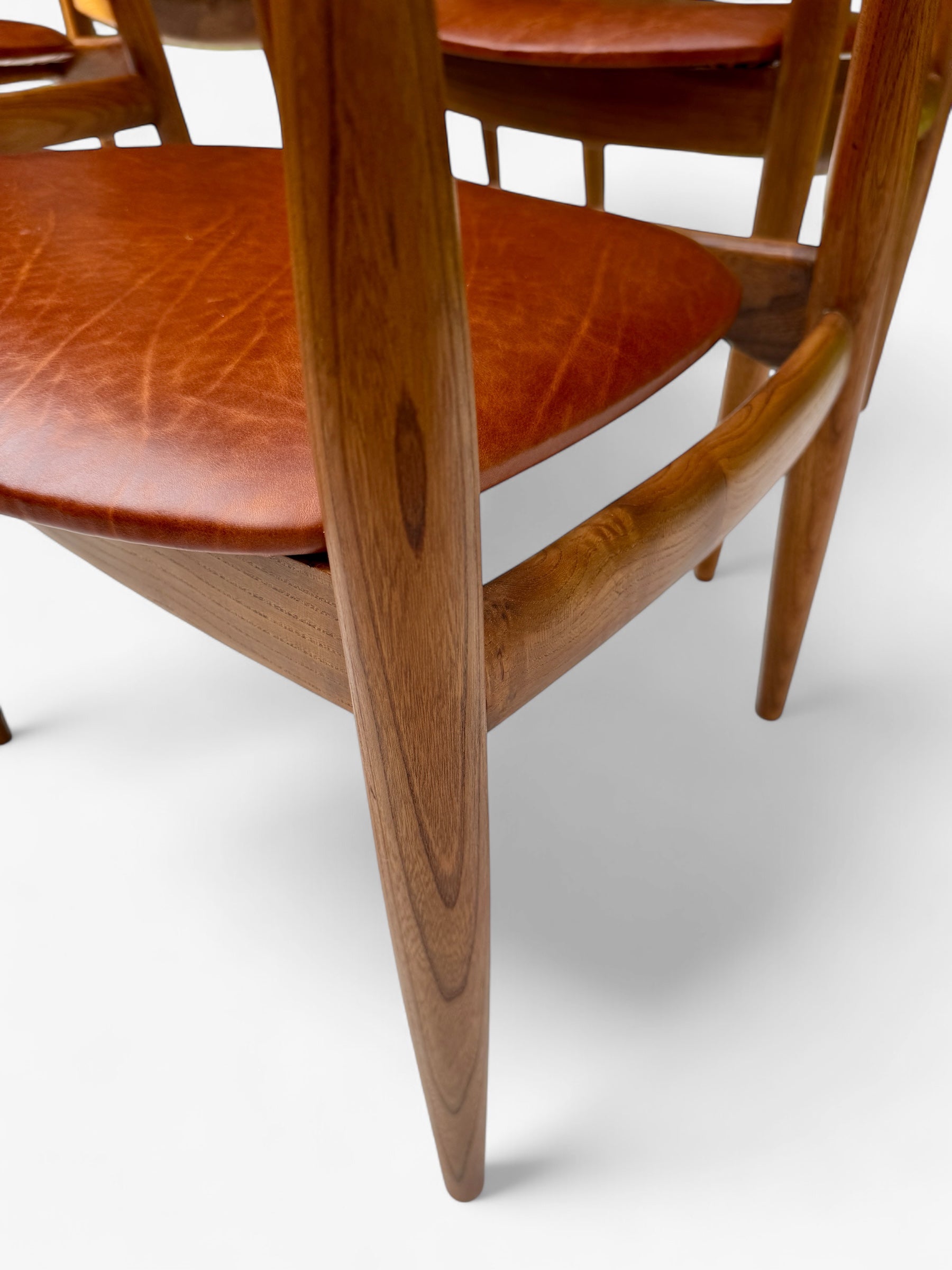 A_Set_of_4_Round_Back_Elm_Wood_Armchairs_by_Illum_Wikkelso_1960's_Denmark