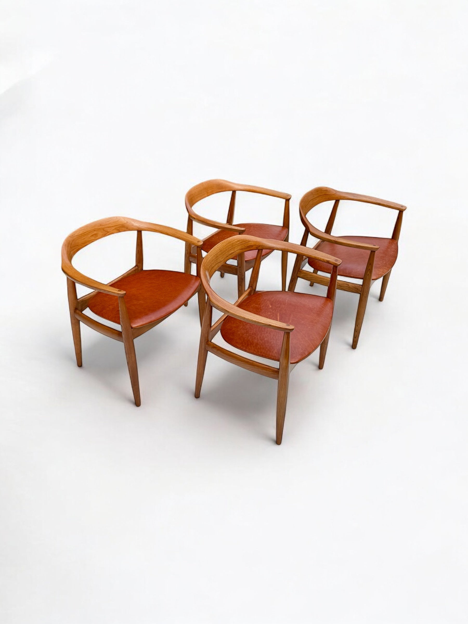 A_Set_of_4_Round_Back_Elm_Wood_Armchairs_by_Illum_Wikkelso_1960's_Denmark