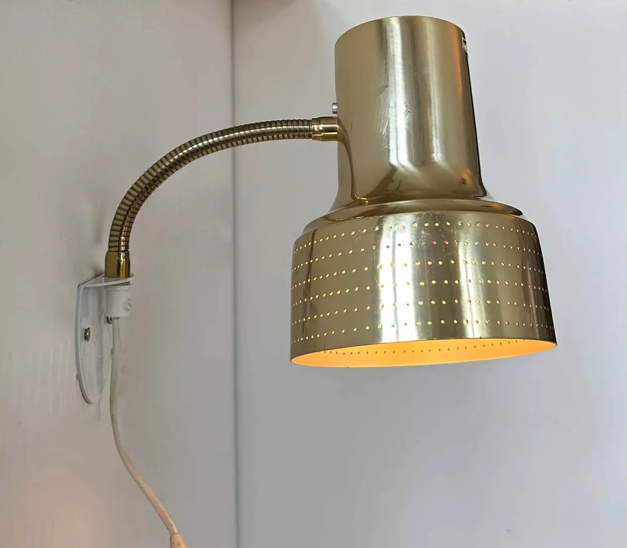 Adjustable_Brass_Wall_Sconce_by_Carl_Thore,_Perforated_Shade,_Sweden_1960s