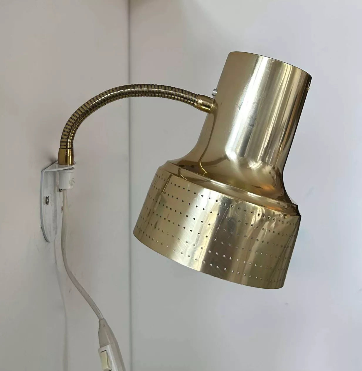Adjustable_Brass_Wall_Sconce_by_Carl_Thore,_Perforated_Shade,_Sweden_1960s