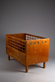 Aino_Aalto_Rare_Children’s_Extendable_Bed_with_Honey_Patina,_1930s,_Finland