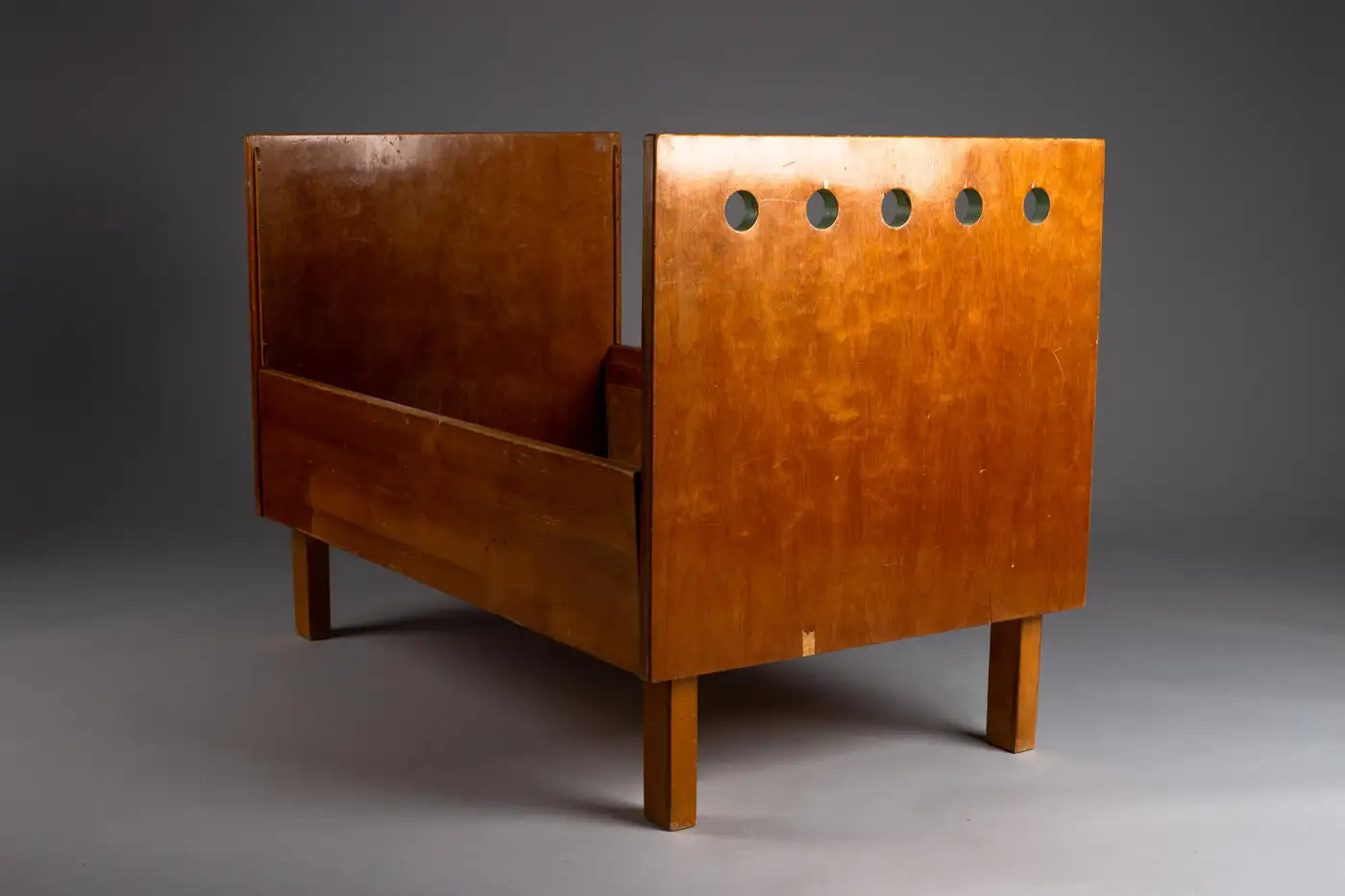 Aino_Aalto_Rare_Children’s_Extendable_Bed_with_Honey_Patina,_1930s,_Finland