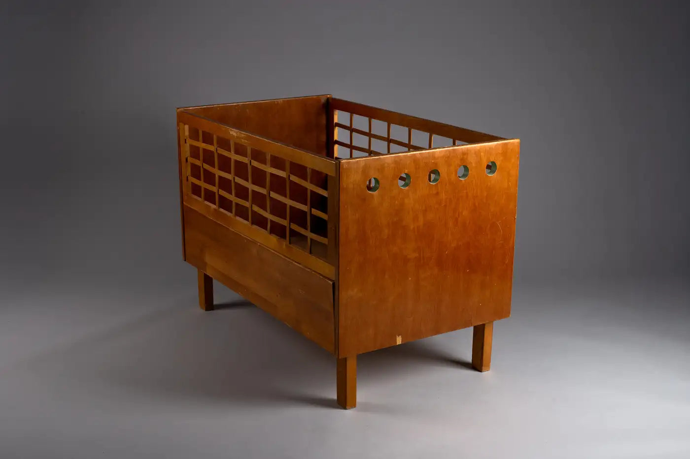 Aino_Aalto_Rare_Children’s_Extendable_Bed_with_Honey_Patina,_1930s,_Finland