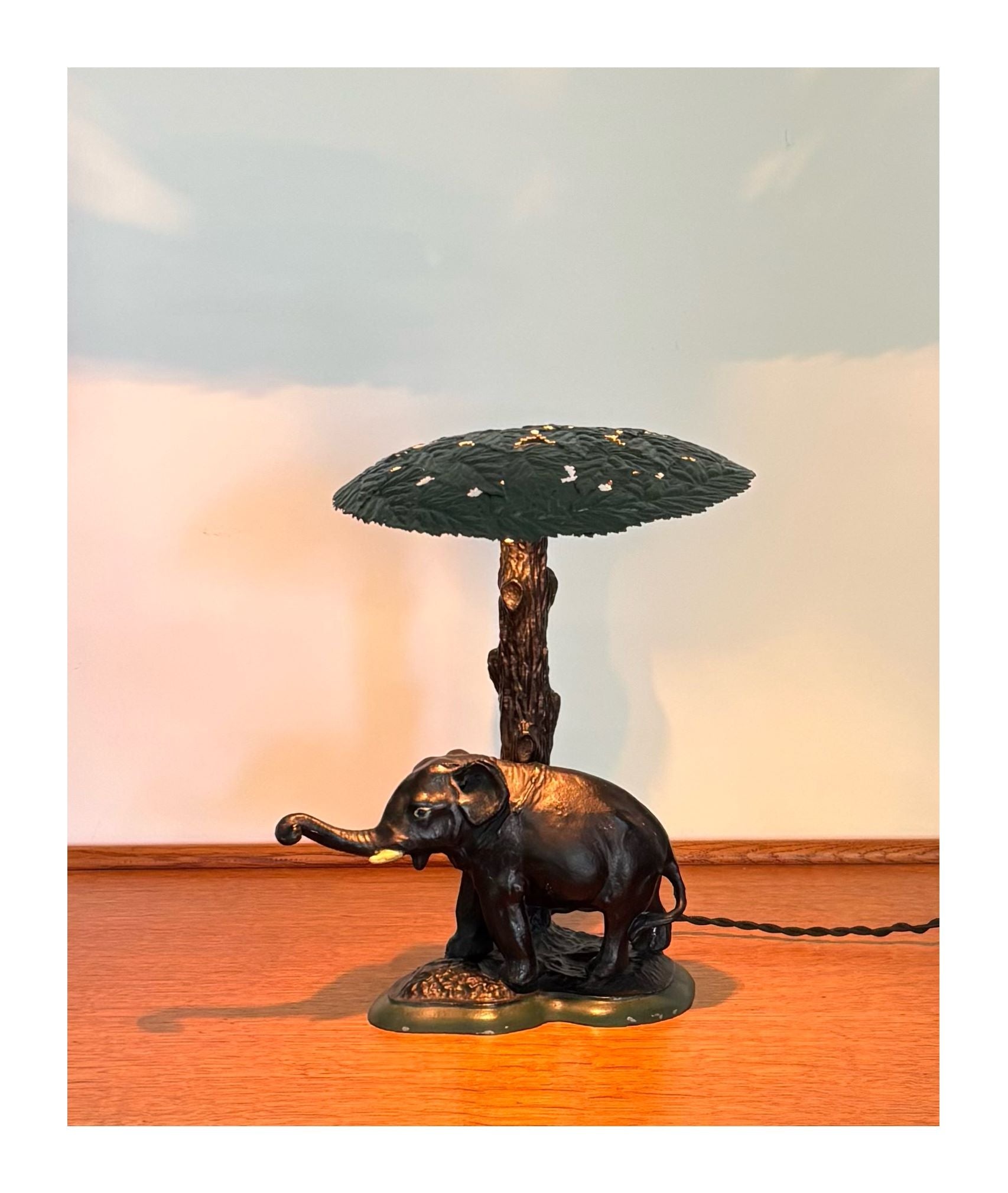 Antique_table_lamp_shaped_as_tree_with_elephant_underneath,_early_20th_century