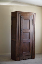 Antique_Tall_Oak_Cabinet,_Made_by_a_French_Cabinetmaker,_Late_19th_Century
