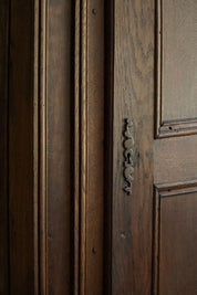Antique_Tall_Oak_Cabinet,_Made_by_a_French_Cabinetmaker,_Late_19th_Century