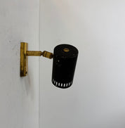 Adjustable_Patinated_Brass_and_Black_Metal_Wall_Light,_France,_1960s